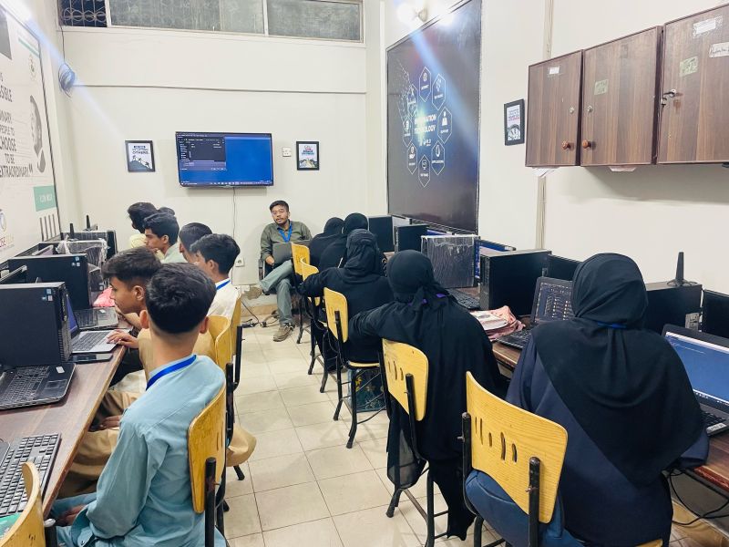Students learning at computers in a Rosetech classroom